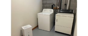 a washer and dryer in a small room