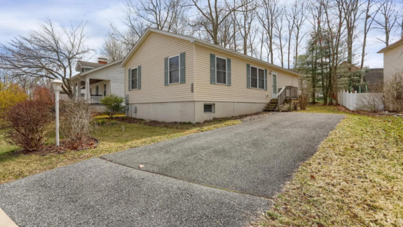 a house with a driveway in front of it